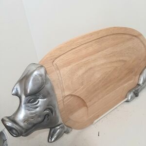 Silver and Brown Pig-Shaped Cutting Board